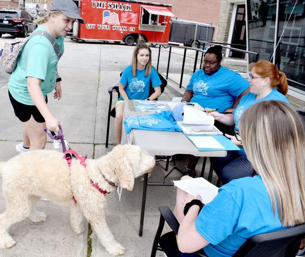 Teachers brave the dunk tank on Disability Awareness Day to raise money for  senior heading for the Special Olympics World Games – AAPS District News