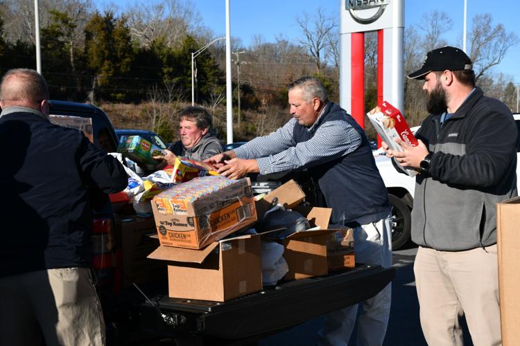 Wallace Nissan Mitsubishi donate trucks of food to Second Harvest, Fill
