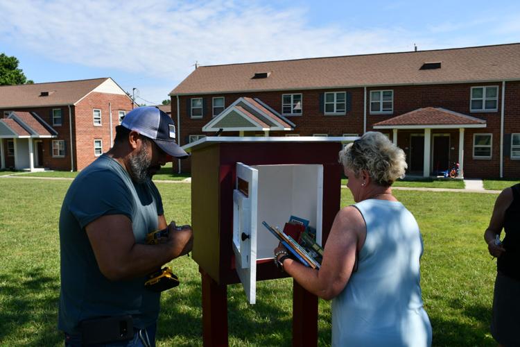Watch now Little Free Library opens at Reedy Pointe Apartments in