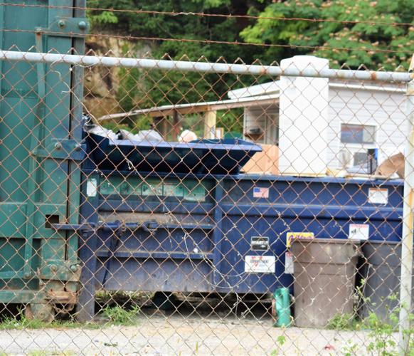 Hawkins responds to complaints about new hoppers at trash convenience