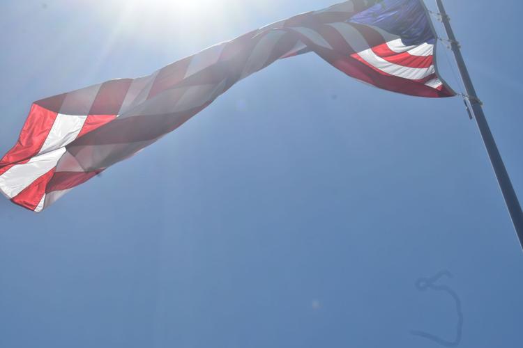 Inglewood, CA, USA, January 2022: The flag of the 56th Super Bowl waving in  the wind with the US national flag blurred in the foreground. The game is  Stock Photo - Alamy