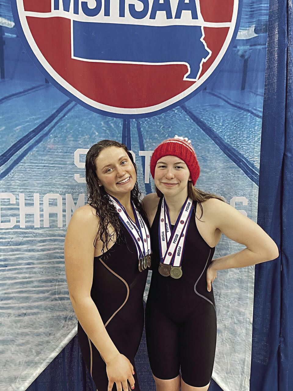 KHS Girls Swim Champs - Ella Pearl (senior) and Nora Lee Brown (freshman).tif