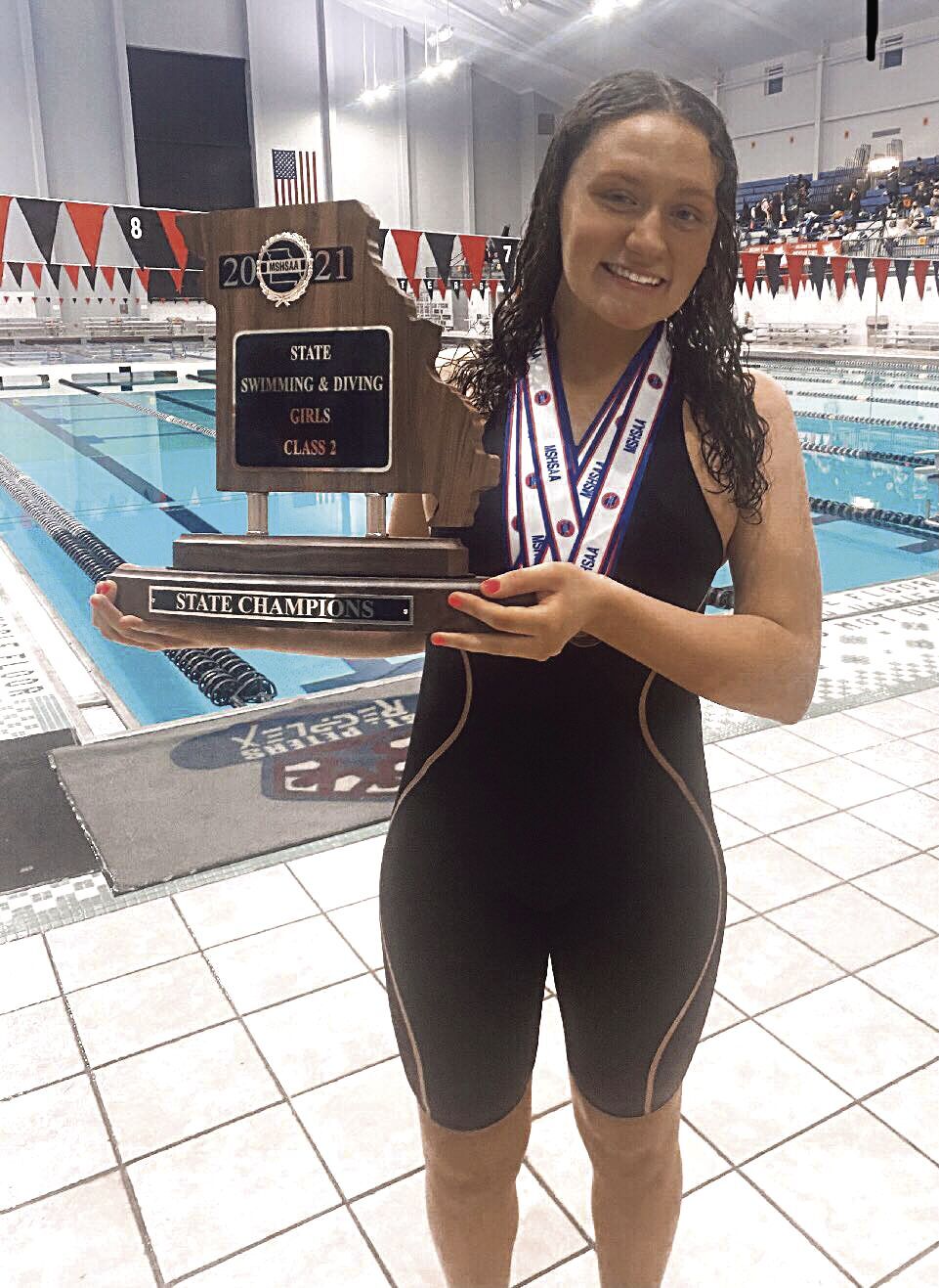 KHS Girls Swim Champs - Ella Pearl senior with trophy.tif