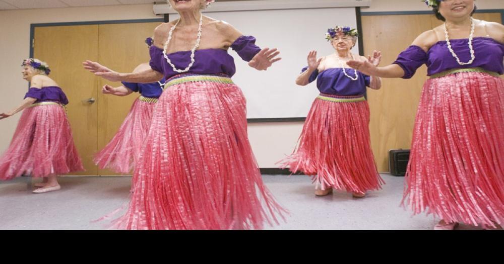 Women 'spread a little happiness' for International Women's Day News