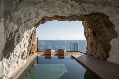 At this new boutique resort in Crete, Greece, go for a swim in your own grotto-inspired suite