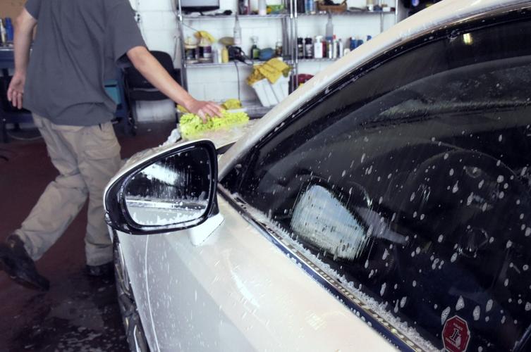 PHOTO SHOOTS At the car wash along the Queensway News