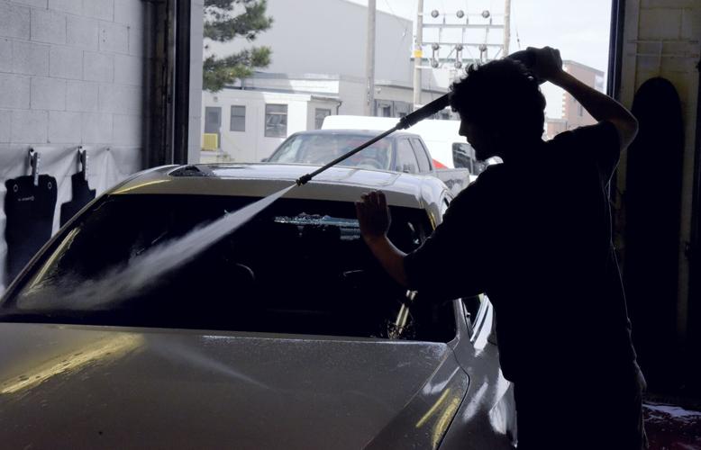 PHOTO SHOOTS At the car wash along the Queensway News