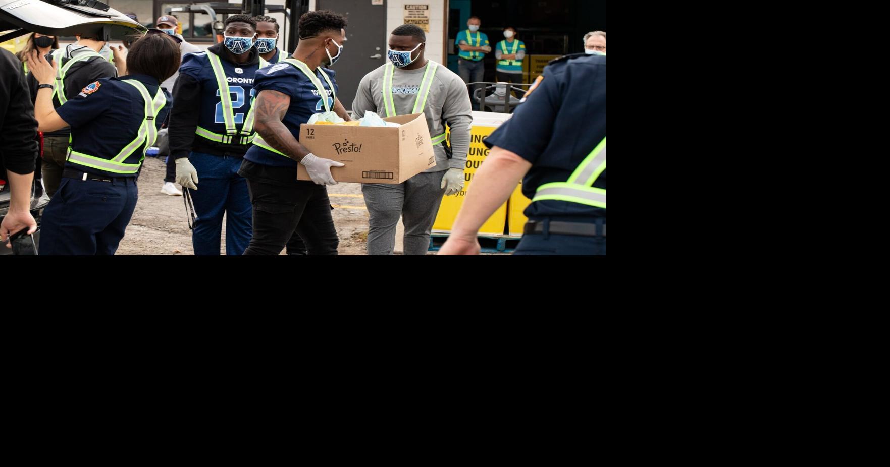 Toronto’s mayor, Argos, firefighters lift 25,000 pounds of food