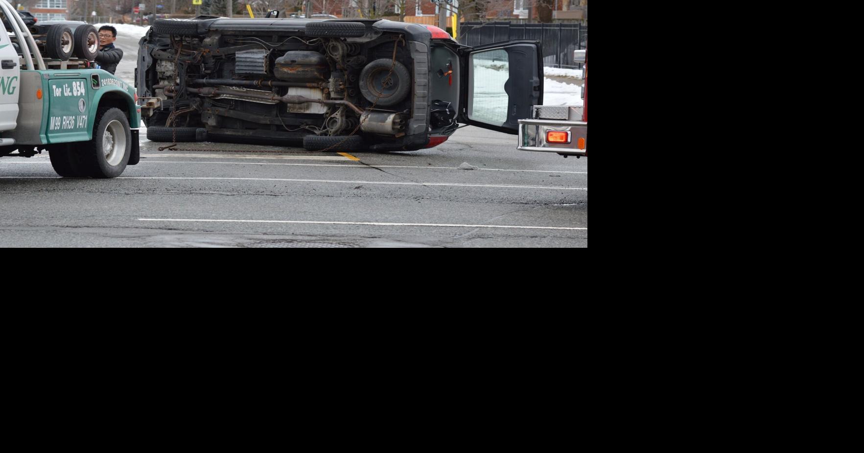 No injuries after SUV rolls over onto its side in Scarborough