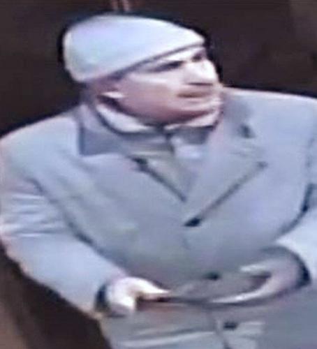 Toronto police release images of downtown break-and-enter suspect