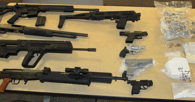 Toronto man facing 30 charges after police allegedly seize guns, drugs