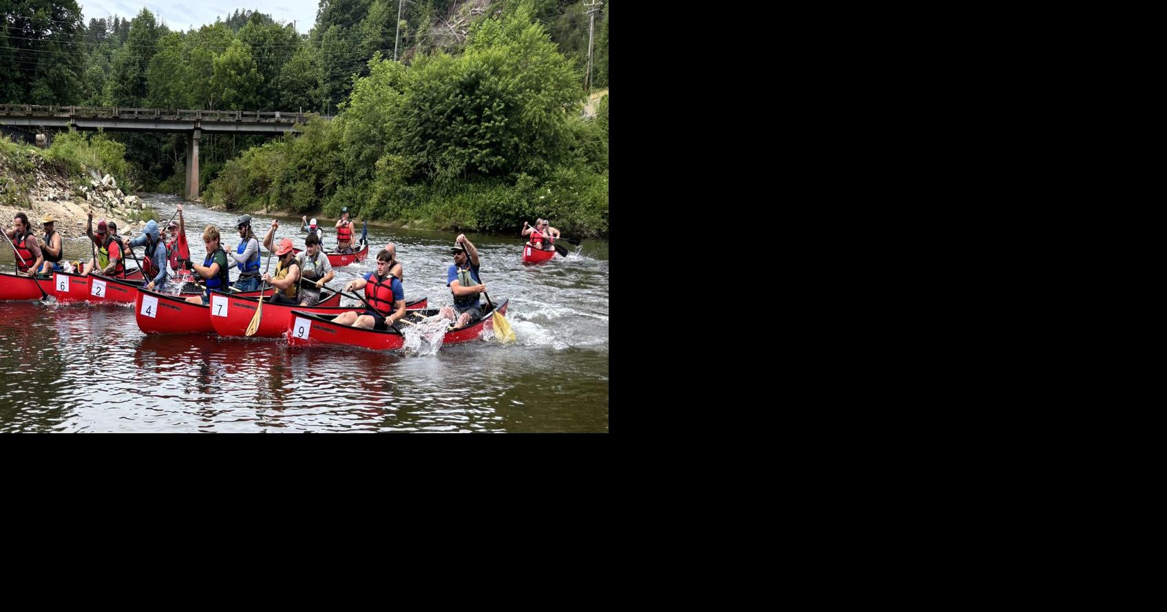 Riverfest visitors celebrate the French Broad