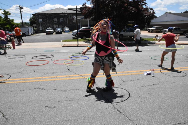 Melanie MacNeil, of Asheville Hoops, showed off her super hula hoop moves.JPG