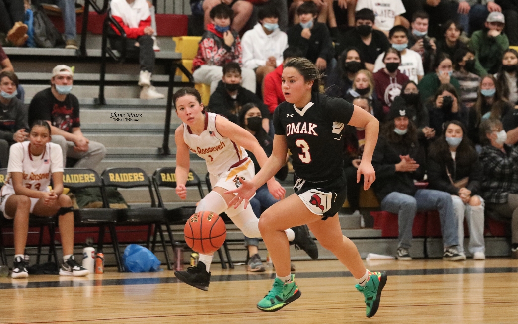 Omak’s Trinity Fjellman (#3 black) dribbles the ball up court against Lake Roosevelt on Tuesday (Dec. 7) evening in non-league action.