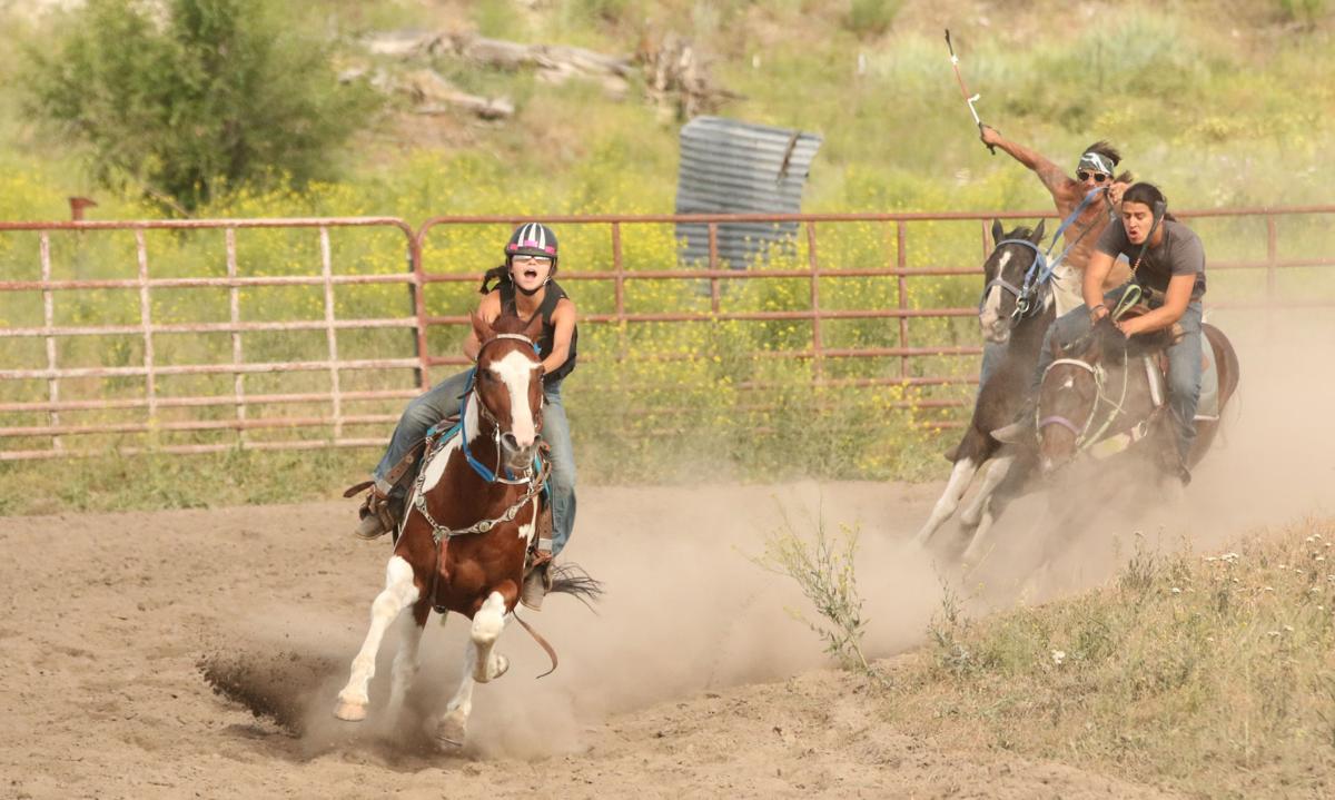 Colville tribal youngster Talliyah Timentwa riding on Bear, would go on to hold off fellow tribal members Tarren and Jason Meusy in the half-mile paint race on Saturday afternoon (June 23) at the Pakootas Dam Horse Races in Nespelem