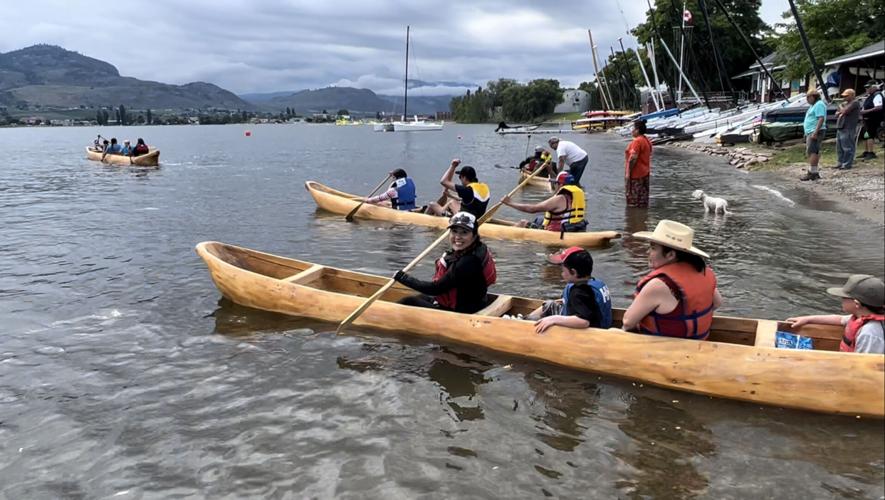 Paddlers start their journey across the lake to Oroville on Monday (July 4) morning.