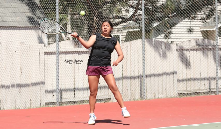Amy Dorman (Colville tribal member) of Lake Roosevelt High School gets ready to hit a forehand shot at this year’s 1B/2B CWB League District tournament on Wednesday (May 18) afternoon at the North Cascades Athletic Club in Omak.