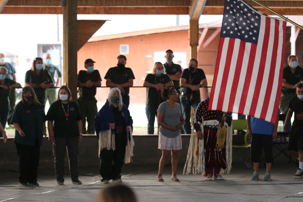 Fire fighters and First Responders for the Chuweah Creek Fire along with members of the Nespelem Community take part in a round dance on Tuesday (July. 27) evening at the Nespelem Arbor