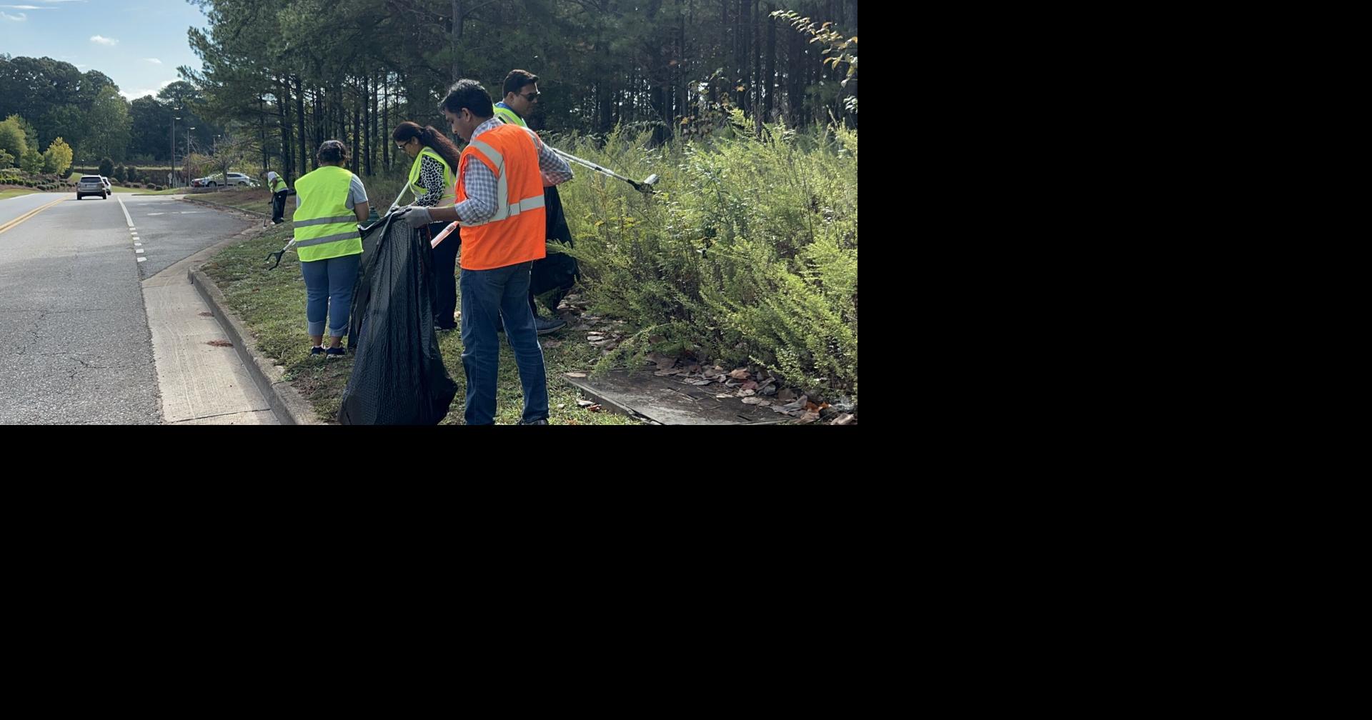 Global Nonprofit Hosts Road Cleanup in Woodstock | Local News ...