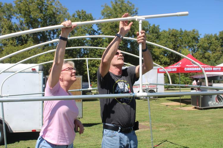 Vendors set up for Riverfest at Etowah River Park Events