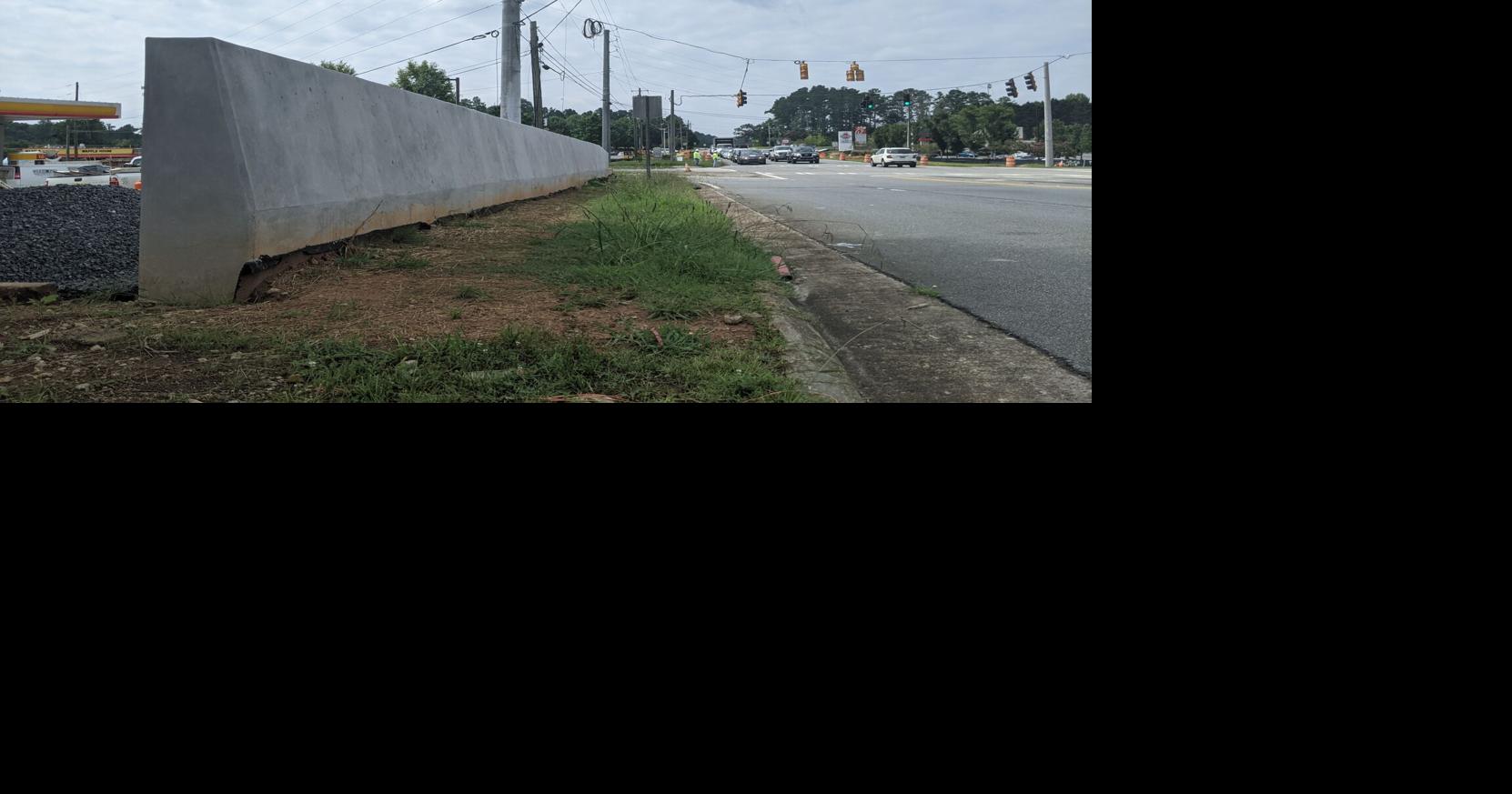 Here's what those walls are on East Cherokee Drive and Highway 140