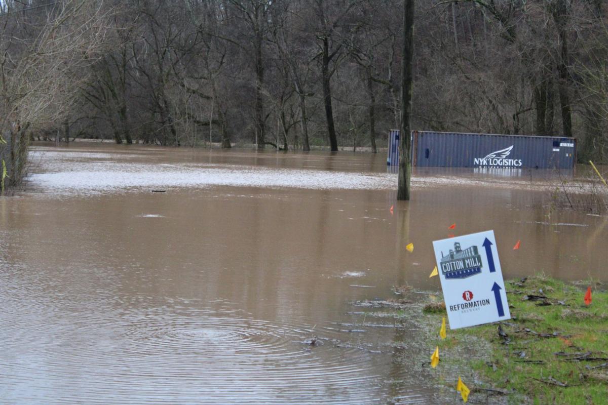 Etowah river floods in Canton, blocks access to shopping center Local News
