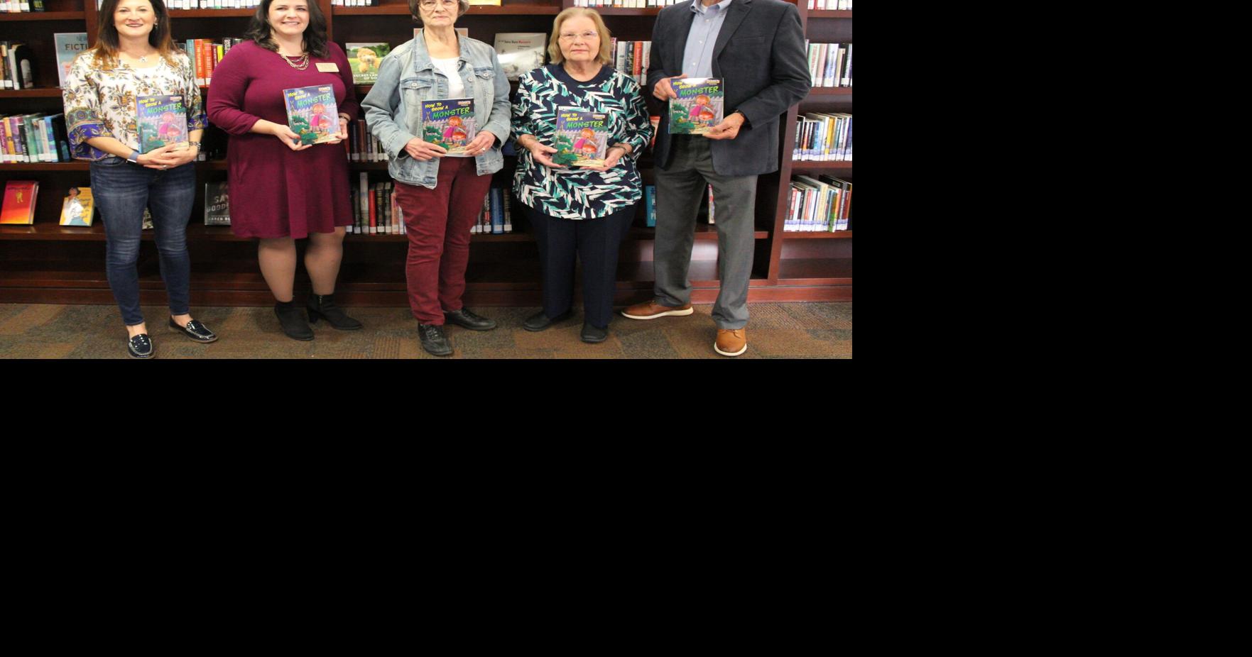 Cherokee County Farm Bureau gives children's books to local libraries