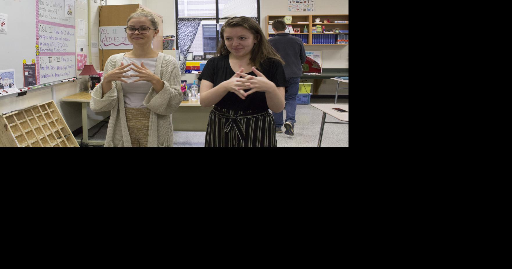 Creekview High students help others using sign language at school ...
