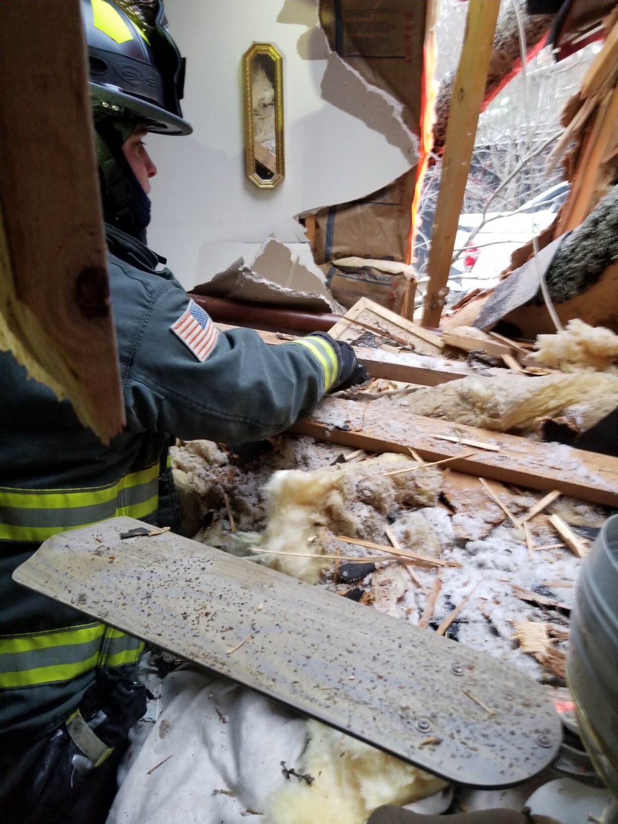 Firefighters rescue trapped couple after tree falls on their house ...