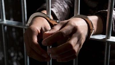 Woman prison officer arrested