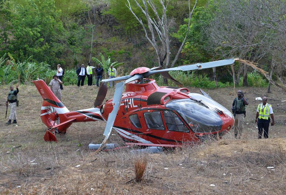 Helicopter crash lands during search for escapees Local News