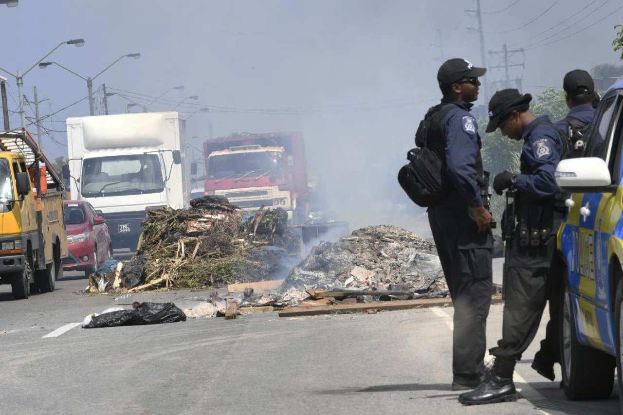 Police open fire, as protests escalate | News Extra | trinidadexpress.com