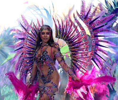 Port of Spain, Trinidad and Tobago: girl in golden bra dancing