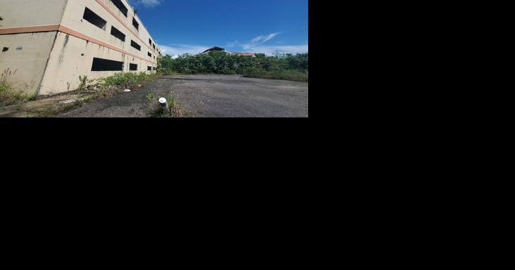A sprawling complex, wrapped around by bushes - Vimarsana News