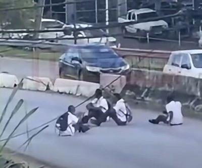 Schoolboys play dangerous game taunting cars