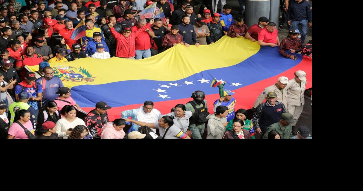Venezuelans march against conflict as US General visits T&T