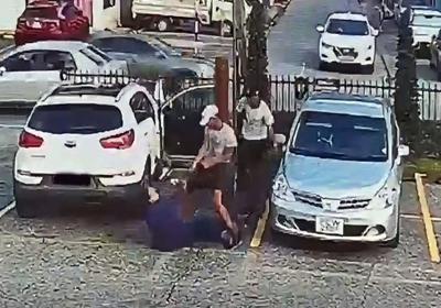 Woman beaten, robbed in car park
