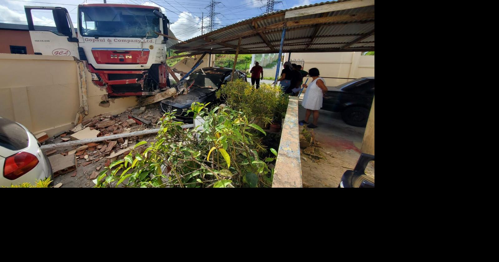 Family jolted out of bed as truck crashes through near midnight