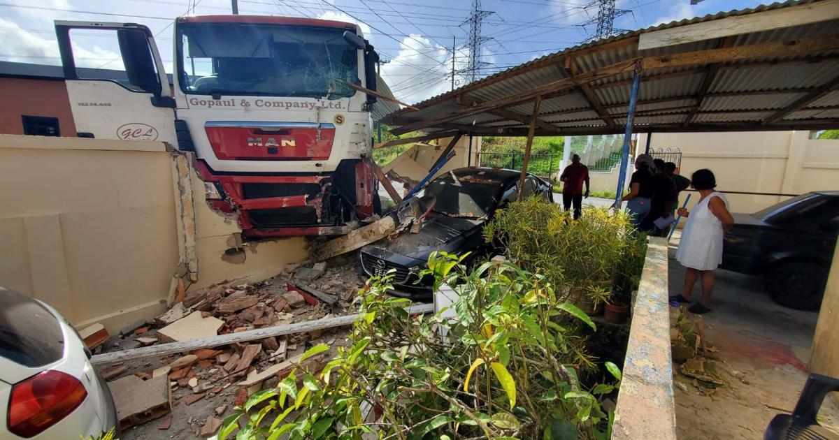 Family jolted out of bed as truck crashes through near midnight