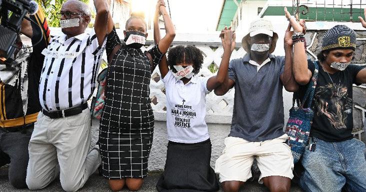 Phillip, mom join protest after release