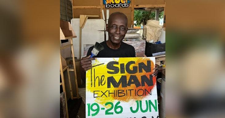 Bruce Cayonne’s hand-painted roadway signs have become a part of T&T fete lore