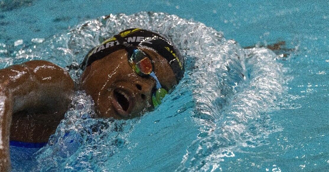 Martinez breaks 1500m free records