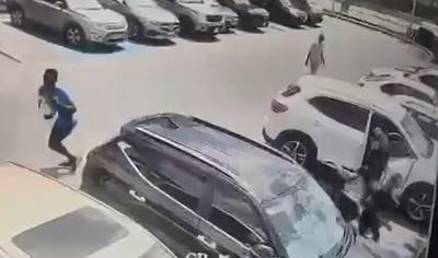 Superpharm attack: Woman robbed of gun, cash and beaten to ground
