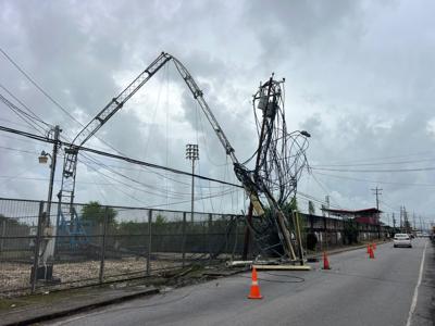 Roofs go flying, power lines down in Grande lightning storm