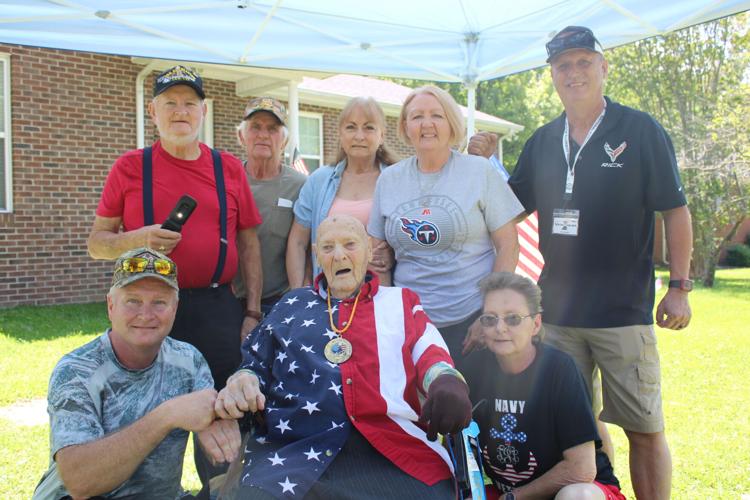 Neighbors surprise 100-year-old Navy veteran with birthday parade