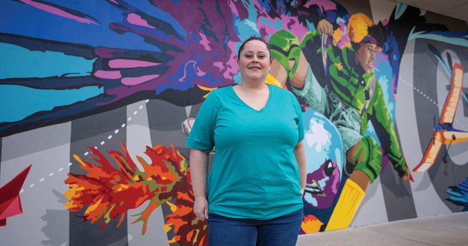 Splash of color: Local artist Carmen Taylor creates mural at Tulsa airport. - Vimarsana News