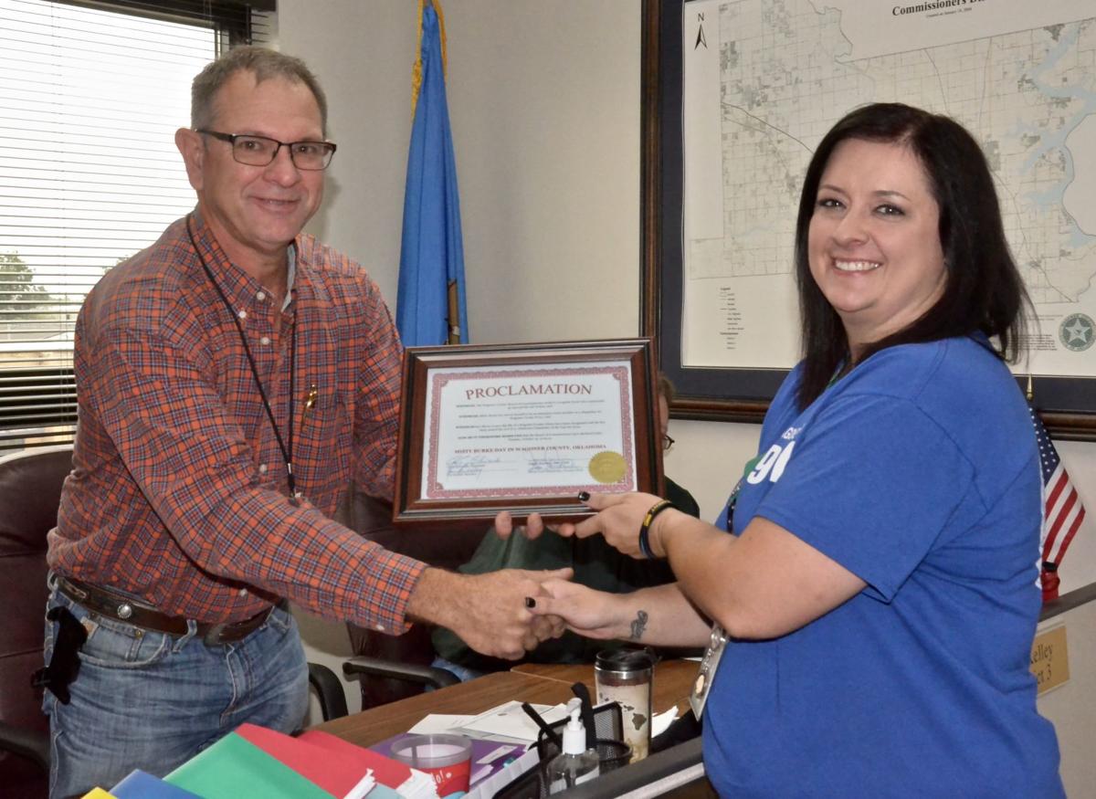 Burke honored for 911 Dispatcher work