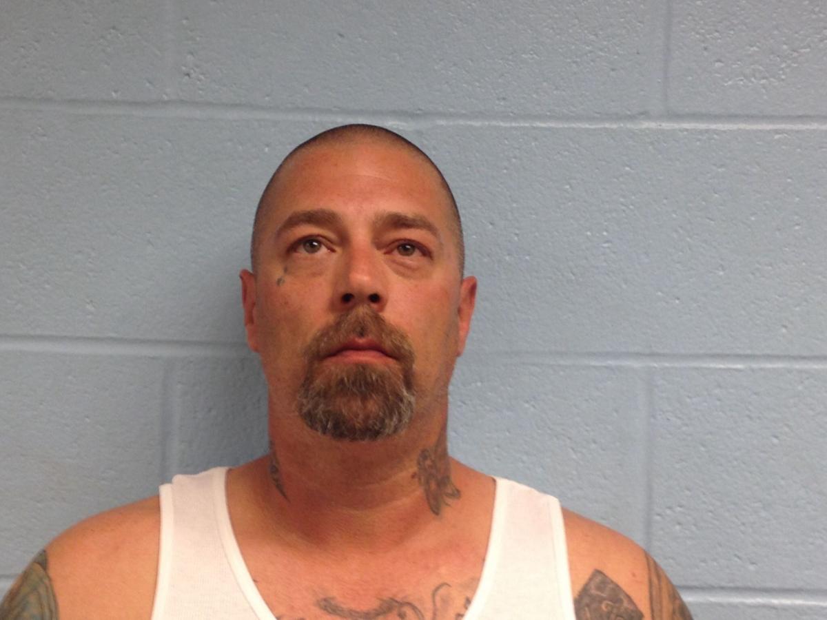 Three arrested after man found dead, badly burned in rural Payne County
