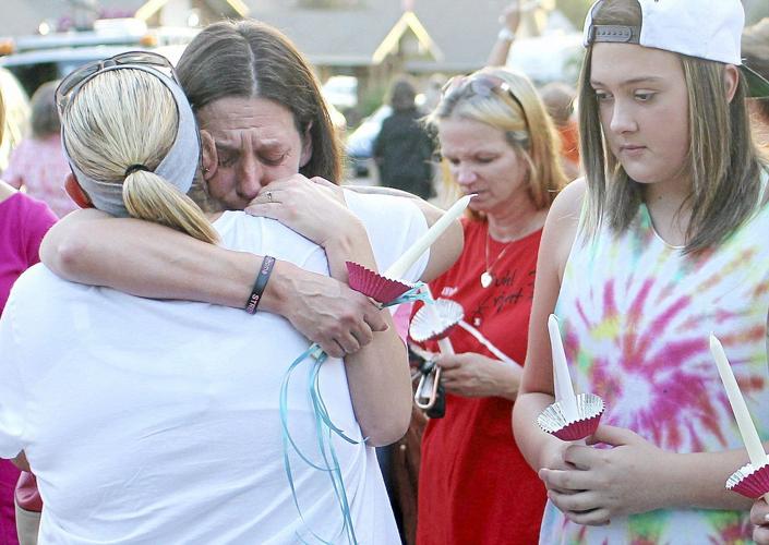 Broken Arrow residents hold vigil for slain, surviving Bever family members