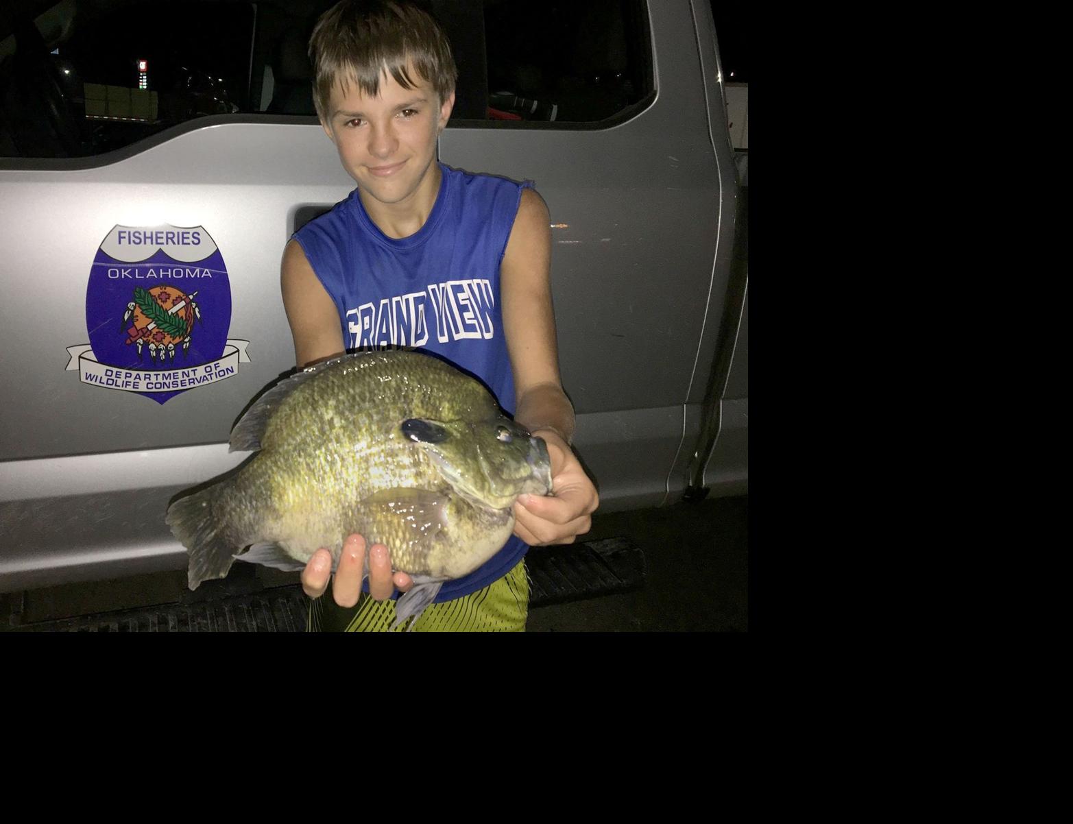 Young angler pulls giant bluegill from tiny Tahlequah golf course pond